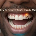 Close-up of a molar with mild decay and subtle gum glow, illustrating ways to ease tooth decay discomfort and dental pain.