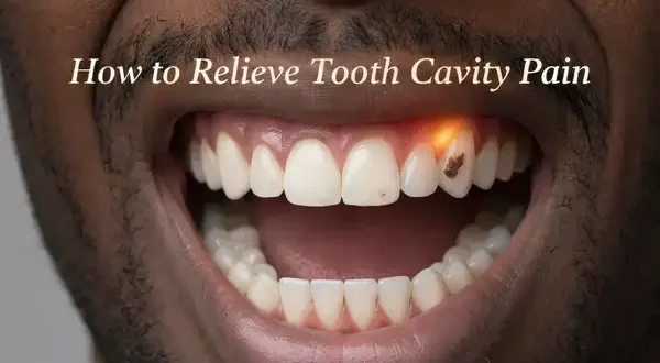 Close-up of a molar with mild decay and subtle gum glow, illustrating ways to ease tooth decay discomfort and dental pain.